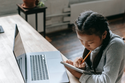 Student working at laptop